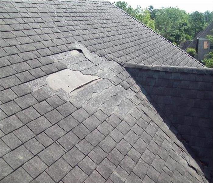 Damaged roof due to storm